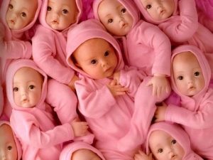 baby among dolls