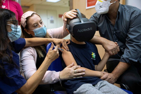 restraining child to vaccinate